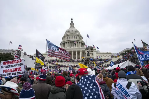 Insurrectionists loyal to President Donald Trump breach the U.S. Capitol in Washington on Jan. 6, 2021. A security operations leader for the far-right Oath Keepers group has been sentenced on Friday, July 21, 2023, to two years of probation. Michael Greene's acquittal on conspiracy charges in the Jan. 6, 2021, Capitol riot had marked a rare setback for prosecutors. (AP Photo/Jose Luis Magana, File)