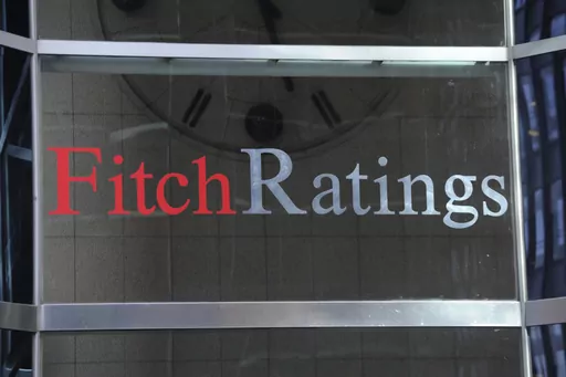 This photo shows signage for Fitch Ratings, Sunday, Oct. 9, 2011, in New York. On Tuesday, Aug. 1, 2023, Fitch Ratings has downgraded the U.S. credit rating, citing an expected increase in government debt over the next three years and a “steady deterioration in standards of governance” over the past two decades. (AP Photo/Henny Ray Abrams, File)