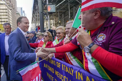 Republican candidate for New York Governor Rep. Lee Zeldin, front left, greets spectators as he marches up 5th Avenue during the annual Columbus Day Parade, Monday, Oct. 10, 2022, in New York. (AP Photo/Mary Altaffer, File)