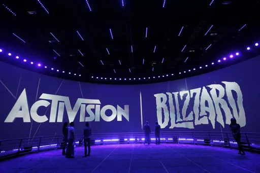 The Activision Blizzard Booth during the Electronic Entertainment Expo in Los Angeles, June 13, 2013. British regulators have blocked Microsoft's $69 billion deal to buy videogame maker Activision Blizzard over worries that it would stifle competition in the cloud gaming market.. (AP Photo/Jae C. Hong, File)