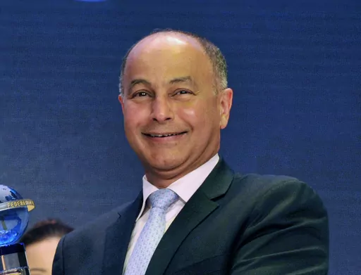 First Vice President of the International Swimming Federation, FINA, Husain Al-Musallam, attends the FINA World Aquatics Gala in Budapest, Hungary, on Jan. 31, 2016. Swimming will set up an “open category” that will include transgender competitors, the governing body of the sport said Tuesday, July 25, 2023. World Aquatics president Husain Al-Musallam said the event would take place in the future but gave no details. (Attila Kovacs/MTI via AP, File)