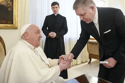 Pope Francis meets with Czech Republic's Prime Minister Robert Fico, right, at The Vatican Friday, Feb. 14, 2025. (Vatican Media via AP, HO)