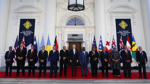 President Joe Biden, center, poses for a photo with Pacific Island leaders on the North Portico of the White House in Washington, Thursday, Sept. 29, 2022. From left, New Caledonia President Louis Mapou, Tonga Prime Minister Siaosi Sovaleni, Palau President Surangel Whipps Jr., Tuvalu Prime Minister Kausea Natano, Micronesia President David Panuelo, Fiji Prime Minister Josaia Voreqe Bainimarama, Biden, Solomon Islands Prime Minister Manasseh Sogavare, Papua New Guinea Prime Minister James Marape