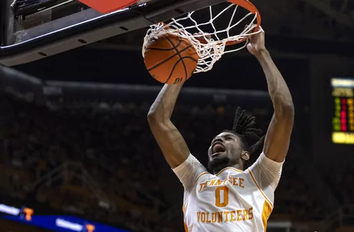 Tennessee forward Jonas Aidoo (0) dunks the ball during the first half of an NCAA college basketball game against Mississippi Saturday, Jan. 6, 2024, in Knoxville, Tenn. (AP Photo/Wade Payne)