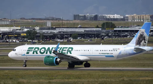 A Frontier Airlines jetliner waits on a runway for departure from Denver International Airport, Sept. 1, 2023, in Denver. Frontier Airlines has settled a lawsuit filed on behalf of pilots who said the airline discriminated against pregnant and breastfeeding employees. In the settlement announced Tuesday, Dec. 5, 2023 Frontier will let pilots pump breast milk in the cockpit during “noncritical phases” of flights. (AP Photo/David Zalubowski, file)