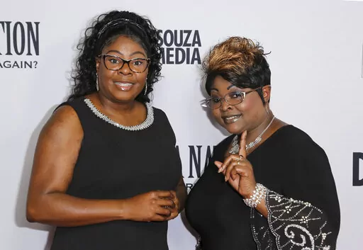 Lynnette Hardaway, left, and Rochelle Richardson, a.k.a. Diamond and Silk, arrive at the LA Premiere of "Death of a Nation" at the Regal Cinemas at L.A. Live on July 31, 2018, in Los Angeles. Hardaway, known by the moniker “Diamond” of the conservative political commentary duo "Diamond and Silk", has died, former President Donald Trump and the pair's official Twitter account announced Monday, Jan. 9, 2023. She was 51. (Photo by Willy Sanjuan/Invision/AP, File)
