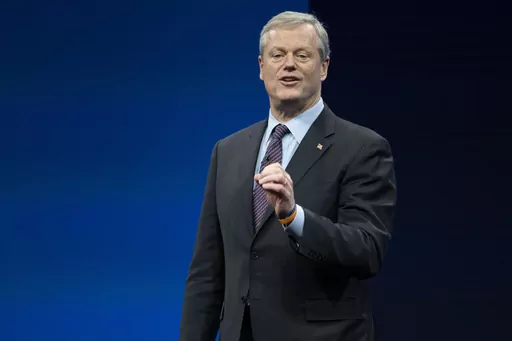 Incoming NCAA president Charlie Baker speaks during the NCAA Convention, Thursday, Jan. 12, 2023, in San Antonio. NCAA President Charlie Baker wants a federal law to regulate the way college athletes can be compensated for name, image and likeness that creates a registry of deals, agent certification and uniform contract standards. (AP Photo/Darren Abate, File)