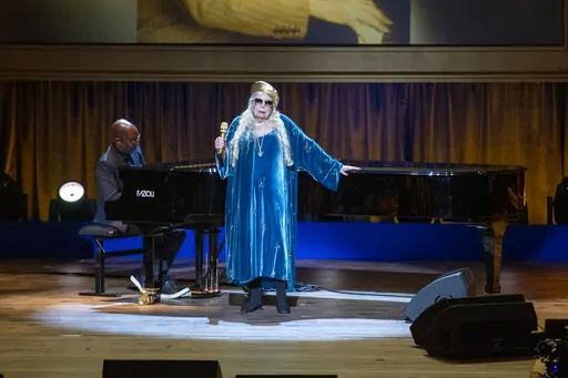 Joni Mitchell performs at the presentation of the Gershwin Prize, which honors a musician's lifetime contribution to popular music, hosted at DAR Constitution Hall in Washington on Wednesday, March 1, 2023. She is this year's winner. (AP Photo/Amanda Andrade-Rhoades)