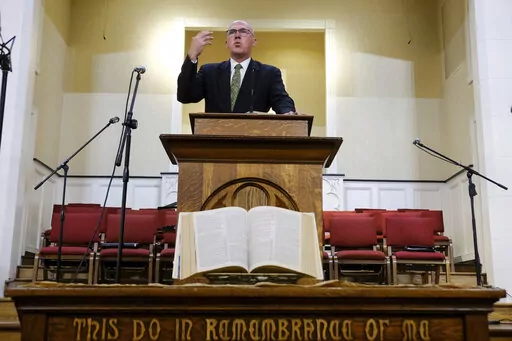 Pastor Bart Barber, president of the Southern Baptist Convention, preaches from the pulpit of the First Baptist Church of Farmersville, Texas, on Sunday, Sept. 25, 2022. For nearly a quarter-century, Barber enjoyed relative obscurity as a pastor in this town of 3,600, about 50 miles northeast of Dallas. That changed in June as delegates to the Southern Baptist Convention’s annual meeting in California, chose Barber to lead the nation’s largest Protestant denomination at a time of major crisi