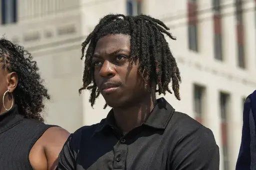 Darryl George stands next to his mother, Darresha George, in front of Galveston County Court House, May 23, 2024, in Galveston, Texas. (Raquel Natalicchio/Houston Chronicle via AP, File)