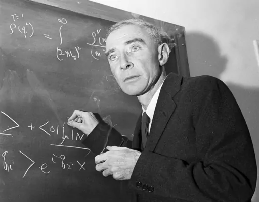 Dr. J. Robert Oppenheimer, creator of the atom bomb, is shown in his study at the Institute for Advanced Study, Dec. 15, 1957, in Princeton, N.J. RR Auction in Boston is taking bids on a rare 1945 report, as well as a letter to a journalist signed by “Opie” that describes the bomb as a “weapon for aggressors.” By Saturday, March 9, 2024, bids for the report had topped $35,000 while the letter was closing in on $5,000. The auction ends Wednesday, March 13. (AP Photo/John Rooney, File)