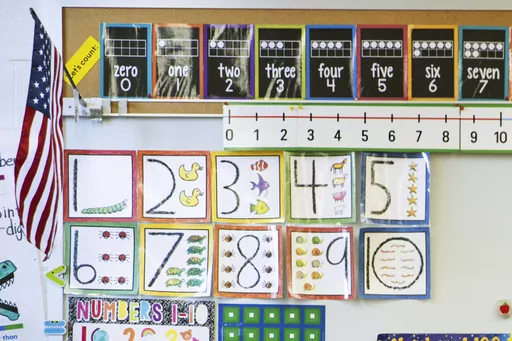 Instructional materials are posted on a wall of a kindergarten class in Maryland on Tuesday, Jan. 24, 2023. The proportion of U.S. kindergartners exempted from school attendance vaccination requirements has hit its highest level ever, 3%, U.S. health officials said Thursday, Nov. 9, 2023. (AP Photo/Julia Nikhinson, File)