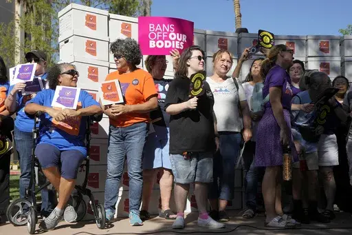 Arizona abortion-rights supporters gather for a news conference prior to delivering over 800,000 petition signatures to the capitol to get abortion rights on the November general election ballot, July 3, 2024, in Phoenix. (AP Photo/Ross D. Franklin, File)