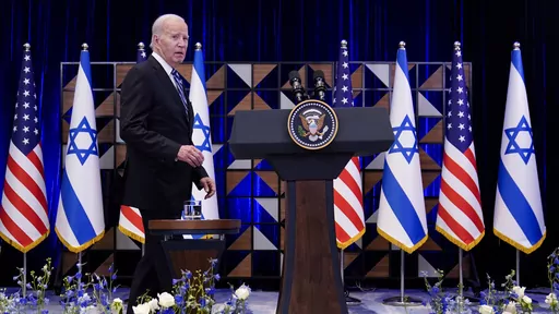 President Joe Biden walks to the podium to deliver remarks on the war between Israel and Hamas after meeting Israeli Prime Minister Benjamin Netanyahu, Wednesday, Oct. 18, 2023, in Tel Aviv. Democratic views on how President Joe Biden is handling the decades-old conflict between Israelis and Palestinians have rebounded slightly, according to a new poll from The Associated Press-NORC Center for Public Affairs Research. (AP Photo/Evan Vucci, File)