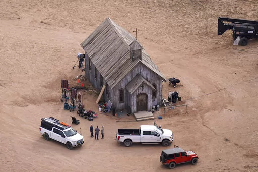 This aerial photo shows the Bonanza Creek Ranch in Santa Fe, N.M., on Saturday, Oct. 23, 2021. A Santa Fe district attorney is prepared to announce whether to press charges in the fatal 2021 film-set shooting of a cinematographer by actor Alec Baldwin during a rehearsal on the set of the Western movie “Rust.” Santa Fe District Attorney Mary Carmack-Altwies said a decision will be announced Thursday morning, Jan. 19, 2022, in a statement and on social media platforms. (AP Photo/Jae C. Hong, F