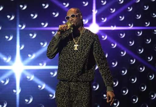 Snoop Dogg performs a tribute to Dr. Dre at the Black Music Collective on Thursday, Feb. 2, 2023, at The Hollywood Palladium in Los Angeles. Asking for privacy, hip-hop legend and longtime marijuana enthusiast Snoop Dogg says he's going to stop smoking — though he didn't specify exactly what that might mean. "After much consideration and conversation with my family, I've decided to give up smoke," Snoop wrote in a message shared on Instagram and X, the platform formerly known as Twitter, on Th