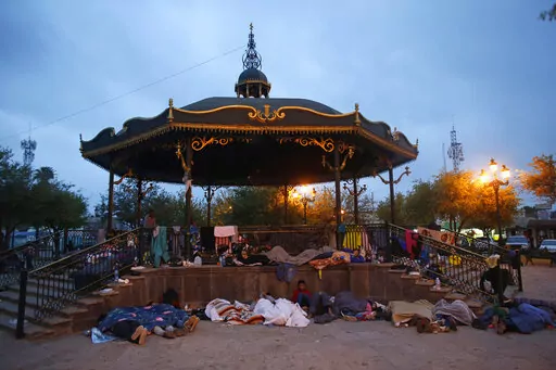 Migrants sleep under a gazebo at a park in Reynosa, Mexico, March 27, 2021. The camp of migrants mainly from Guatemala, El Salvador, Honduras and Haiti sprung up after U.S. officials. citing the pandemic, invoked a a health rule that denies migrants a chance to seek asylum. (AP Photo/Dario Lopez-Mills, File)
