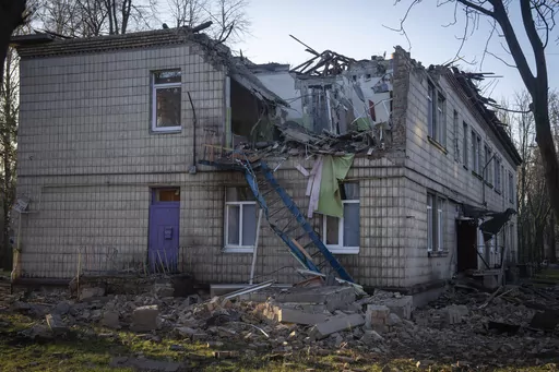 A damaged kindergarten following a Russian drone attack in Kyiv, Ukraine, Saturday, Nov. 25, 2023. Russia launched its most intense drone attack on Ukraine since the beginning of its full-scale invasion on Saturday morning, military officials said. (AP Photo/Efrem Lukatsky)