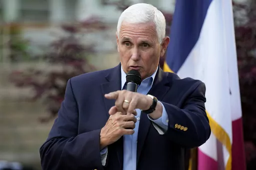 Former Vice President Mike Pence speaks to local residents during a meet and greet, May 23, 2023, in Des Moines, Iowa. The Department of Justice has informed former Vice President Mike Pence’s legal team that it won't pursue criminal charges related to the discovery of classified documents at his Indiana home. (AP Photo/Charlie Neibergall, File)