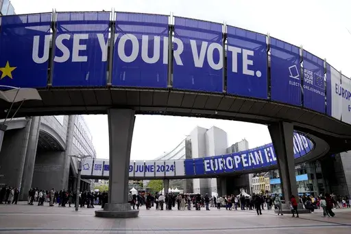 People wait in line to visit the European Parliament during Europe Day celebrations in Brussels on May 4, 2024. (AP Photo/Virginia Mayo, File)