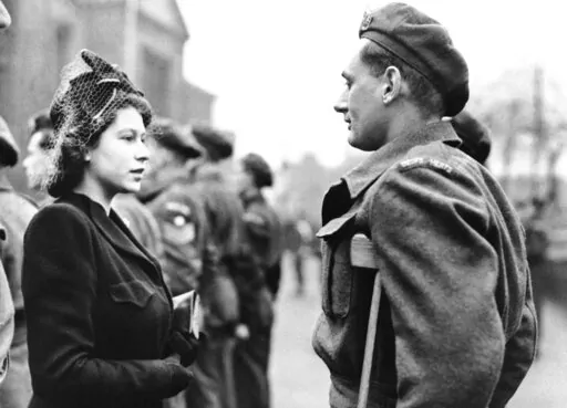 Princess Elizabeth of England talks to Private Rupert John Worth during a visit to Bedford, England on Feb. 14, 1946. (AP Photo, File)