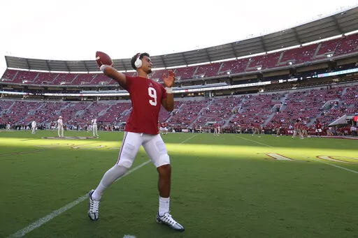 Alabama quarterback Bryce Young warms up for the team's NCAA college football game against Vanderbilt, Saturday, Sept. 24, 2022, in Tuscaloosa, Ala. (AP Photo/Vasha Hunt)
