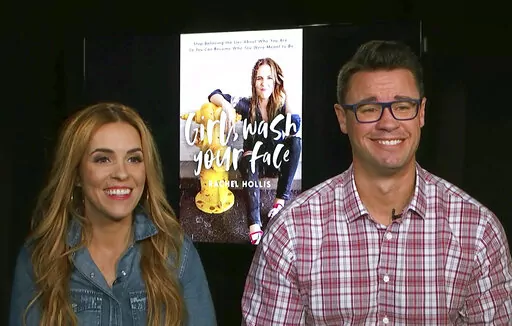 This image taken from video shows Rachel Hollis, left, author of "Girl, Wash Your Face: Stop Believing the Lies About Who You Are so You Can Become Who You Were Meant to Be," and her husband Dave Hollis, during an interview on Aug. 28, 2018, in New York. Dave Hollis, who left his spot as a Disney executive to join this then-wife Rachel in running her lifestyles empire, which include her bestselling book “Girl, Wash Your Face,” has died at his home in Texas on Sunday, Feb. 12, 2023. He was 47