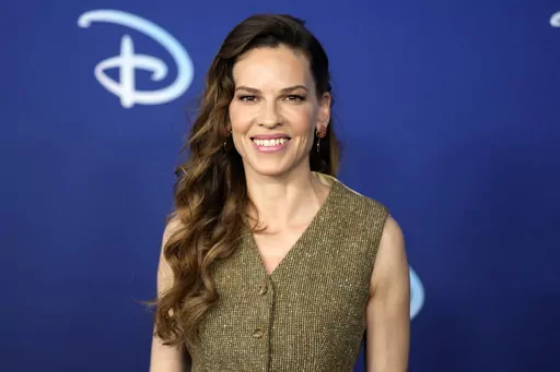 Hilary Swank attends the Disney 2022 Upfront presentation at Basketball City Pier 36 on Tuesday, May 17, 2022, in New York. Swank has given birth to twins — a boy and a girl. The 48-year-old “Million Dollar Baby” actor posted a photo of her and her twins looking at the sunset on Instagram Sunday. (Photo by Charles Sykes/Invision/AP, File)