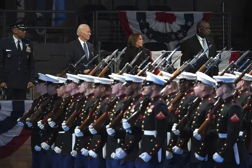 Chairman of the Joint Chiefs of Staff Gen. CQ Brown, from left, President Joe Biden, Vice President Kamala Harris and Defense Secretary Lloyd Austin watch during a Department of Defense Commander in Chief farewell ceremony at Joint Base Myer-Henderson Hall, Thursday, Jan. 16, 2025, in Arlington, Va. (AP Photo/Evan Vucci)