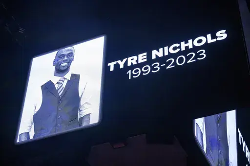 The screen at the Smoothie King Center in New Orleans honors Tyre Nichols before an NBA basketball game between the New Orleans Pelicans and the Washington Wizards, Jan. 28, 2023. (AP Photo/Matthew Hinton, File)