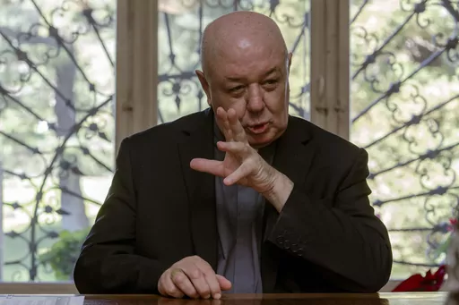 Prefect of the Archivio Apostolico Vaticano, Bishop Sergio Pagano speaks in his office at The Vatican, Wednesday, Feb. 14, 2024, during an interview with The Associated Press. In a new book-length interview with Italian journalist Massimo Franco, “Secretum”, Pagano divulges some of the unknown or behind-the-scenes details of well-known sagas of the Holy See and its relations with the outside world over the past 12 centuries. From Napoleon’s sacking of the archive in 1810 to the Galileo aff