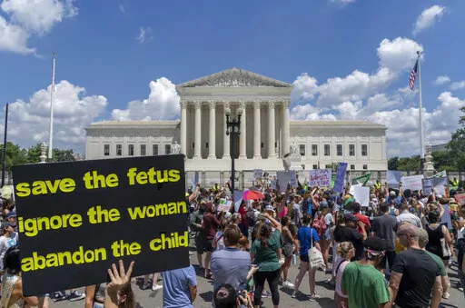 Abortion-rights protesters demonstrate outside the Supreme Court in Washington, Saturday, June 25, 2022. A new poll finds a growing percentage of Americans calling out abortion or women’s rights as priorities for the government in the wake of the Supreme Court’s decision to overturn Roe v. Wade, especially among Democrats and those who support abortion access.  (AP Photo/Gemunu Amarasinghe, File)