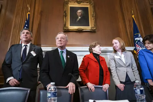 From left, European Union Ambassador Stavros Lambrinidis, Sen. Dick Durbin, D-Ill., Sen. Jeanne Shaheen, D-N.H., German Ambassador Emily Haber, and Lithuanian Ambassador Audra Plepyte join other diplomats to discuss the Russian invasion of Ukraine, at the Capitol in Washington, Thursday, March 10, 2022.  (AP Photo/J. Scott Applewhite)