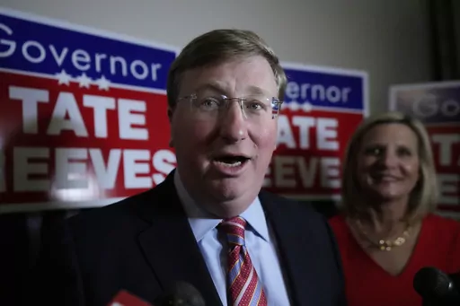 With wife Elee Reeves at his side, Mississippi Gov. Tate Reeves speaks in Jackson, Miss., after winning the Republican primary on Tuesday, Aug. 8, 2023. Records show Tate Reeves received a $10,000 campaign contribution from a shipping company executive in 2020, several days before the state announced incentives for a division of the company to expand its operation in Mississippi. (AP Photo/Rogelio V. Solis, File)