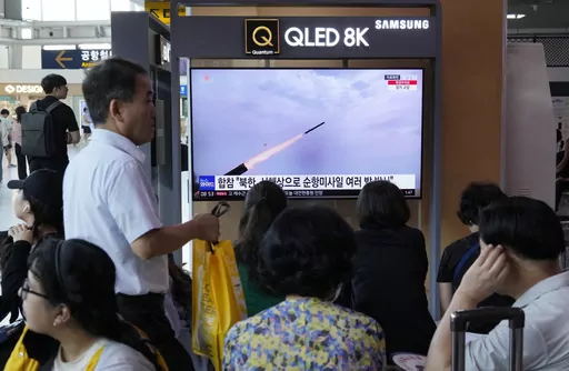 A TV screen shows a file image of North Korea's missile launch during a news program at the Seoul Railway Station in Seoul, South Korea, Saturday, July 22, 2023. North Korea fired several cruise missiles toward its western sea Saturday, South Korea's military said, marking the second launch event this week apparently in protest of the docking of a nuclear-armed U.S. submarine in South Korea. (AP Photo/Ahn Young-joon)