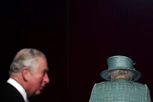 Britain's Queen Elizabeth and Prince Charles arrive for the State Opening of Parliament at the Houses of Parliament in London, Thursday Dec. 19, 2019. After spending much of his adult life in the shadow of Queen Elizabeth II, Prince Charles has taken on a greater public role in recent years, increasingly standing in for his mother in her twilight years. In May, he presided over the state opening of Parliament, the most public symbol of the monarch’s role as head of state. (Toby Melville, Pool 