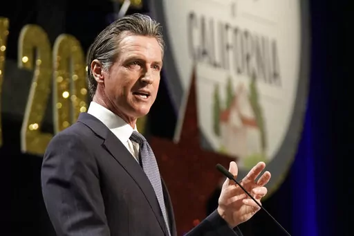 California Gov. Gavin Newsom speaks at the California Association of Realtors Legislative Day in Sacramento, Calif., Wednesday, April 27, 2022. A year after beating back a recall, Newsom is expected to cruise to a re-election victory ahead of challenger Republican state Sen. Brian Dahle. (AP Photo/Rich Pedroncelli, File)