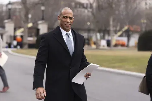 Housing and Urban Development Secretary Scott Turner, walks towards the West Wing following a TV interview at the White House, Wednesday, Feb. 19, 2025, in Washington. (AP Photo/Manuel Balce Ceneta,File)
