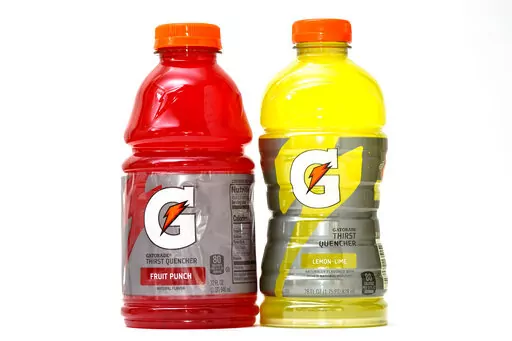 Bottles of Gatorade are pictured, left, a 32 fluid ounce and 28 fluid ounce, in Glenside, Pa., Monday, June 6, 2022. (AP Photo/Matt Rourke)