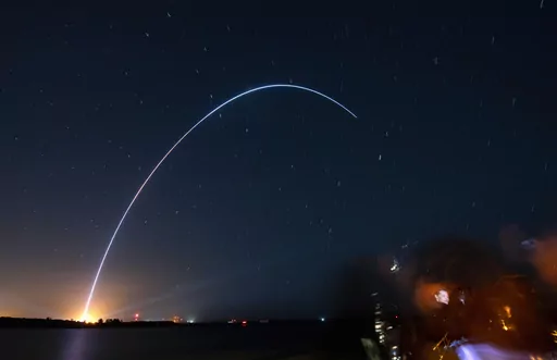 Spectators at Jetty Park in Cape Canaveral, Fla., watch as Terran I, a 3D-printed rocket by Relativity Space, lifts off from Cape Canaveral Space Force Station late Wednesday, March 22, 2023. (Craig Bailey/Florida Today via AP)