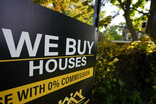 A sign is seen near a home being remodeled, Wednesday, Oct. 12, 2022, in Towson, Md. Would-be homebuyers are willing to take on sharply higher mortgage payments, even as home prices have begun to pull back in 2023. (AP Photo/Julio Cortez, File)