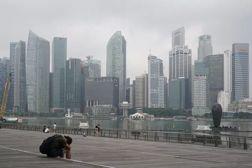 The central business district is shrouded by haze in Singapore, on Sept. 23, 2019. Singapore conducted its first execution of a woman in 19 years on Friday, July 28, 2023, and its second hanging this week for drug trafficking despite calls for the city-state to cease capital punishment for drug-related crimes. (AP Photo/Vincent Thian, File)