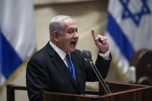 Former Israeli Prime Minister Benjamin Netanyahu speaks at the Knesset, Israel's parliament, in Jerusalem, June 30, 2022.  Israel is holding its fifth national election in under four years, and once again the race is shaping up as a referendum on  Netanyahu’s fitness to rule.  (AP Photo/Ariel Schalit, File