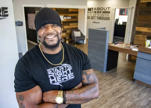 Will Keeps, president of Starts Right Here, stands for a photo at his organization in Des Moines, Iowa, July 13, 2021. On Friday, Feb. 3, 2023, Keeps, founder of the Starts Right Here program for at-risk youth in Des Moines, said he will remain “all in on helping kids that are not reachable in so many peoples' eyes” after he was wounded in last month's shooting that killed two of his students. (Zach Boyden-Holmes/The Des Moines Register via AP, File)