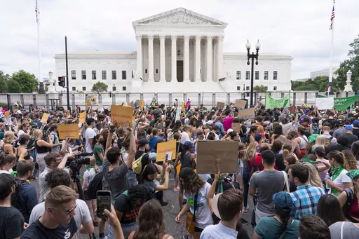 Protesters gather outside the Supreme Court in Washington, Friday, June 24, 2022, after the Supreme Court ended constitutional protections for abortion that had been in place nearly 50 years. More than a quarter of female Black voters describe abortion as their top issue in this year's presidential election, a new survey out Thursday from health policy research firm KFF finds. (AP Photo/Jacquelyn Martin, File)