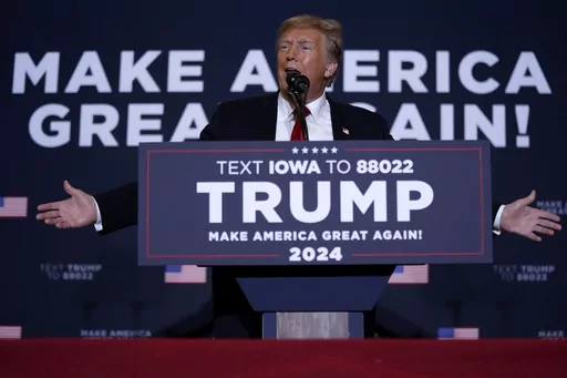 Former President Donald Trump speaks during a commit to caucus rally, Wednesday, Dec. 13, 2023, in Coralville, Iowa. Trump is pushing his supporters to deliver a blowout win in the Iowa caucuses one month away. Unlike his first time in the caucuses, Trump’s campaign is now run by Iowa veterans who are not just locking in caucus commitments but building a formidable organization to try to lock in his lead. (AP Photo/Charlie Neibergall, File)