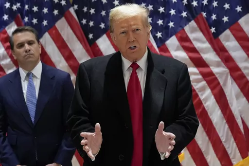 Former President Donald Trump speaks during a press conference at 40 Wall Street after a pre-trial hearing at Manhattan criminal court, Monday, March 25, 2024, in New York. A New York judge has scheduled an April 15 trial date in former President Donald Trump's hush money case. Judge Juan M. Merchan made the ruling Monday.(AP Photo/Frank Franklin II)