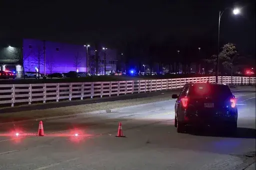 This image taken from video provided by WSYX shows police responding to an active shooter early Wednesday, Feb. 5, 2025, in New Albany, Ohio. (WSYX via AP)