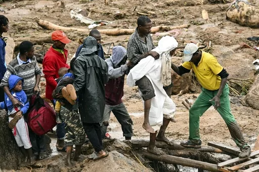 An injured man is carried in Blantyre, Malawi, Monday, March 13, 2023, in the aftermath of Cyclone Freddy. This year’s COP28 in Dubai is likely to see more discussion about compensation for developing nations harmed by climate change. (AP Photo/Thoko Chikondi, File)