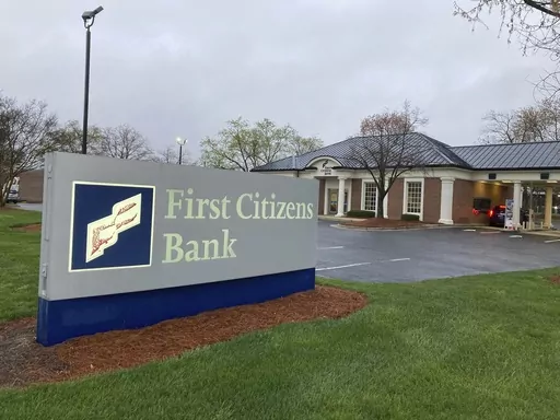 A First Citizens Bank sign is seen in Durham, North Carolina, on Monday March 27, 2023. North Carolina-based First Citizens will buy Silicon Valley Bank, the tech industry-focused financial institution that collapsed earlier this month. (AP Photo/Jonathan Drew)